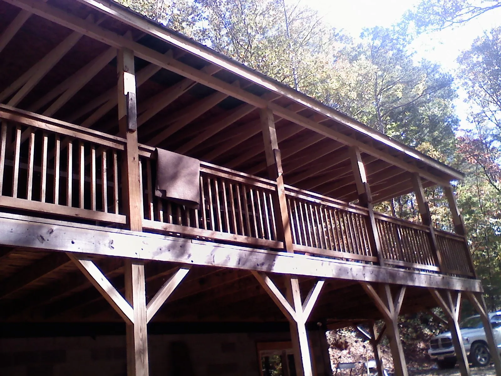 Timber framing under a new elevated porch and deck — Roof Leak Repair in Wichita Falls by Roofing Brothers